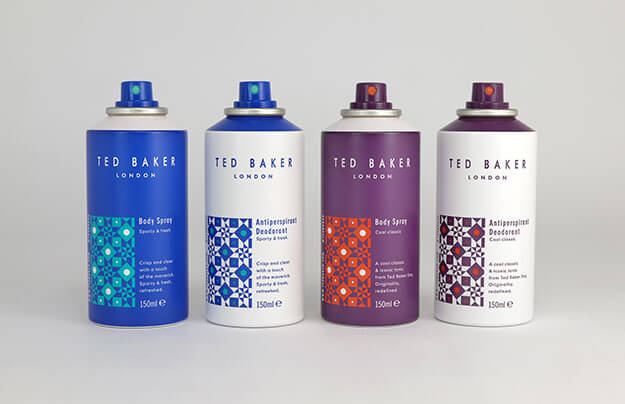 Four Ted Baker Mens’ deodorant spray cans lined up. White background.