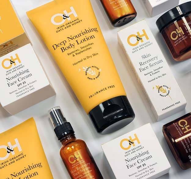 Asda O&H Irish Oats & Honey Skincare product range, laid flat, yellow and black packaging. EPC. Design by Andsome Ltd