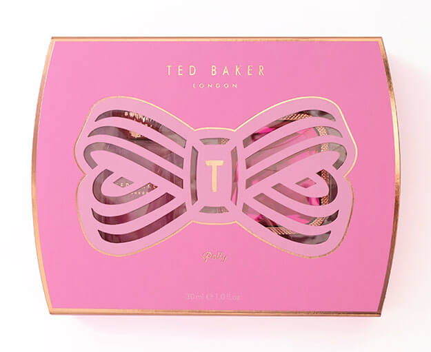 Ted Baker fine fragrance gift packaging. Box with cut out bow detail, pink and gold. Design by Andsome Ltd